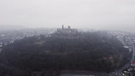 Aerial-footage-of-Braunfels-castle-on-a-gloomy-winter-day