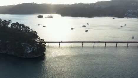 Fukuurajima-island-and-red-bridge,-Aerial-view-of-Matsushima,-Miyagi-Japan