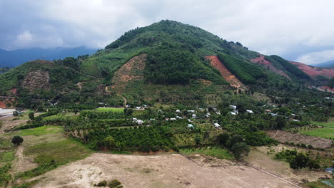 Rural-scene,-mountain-with-areas-of-deforestation,-Vietnam