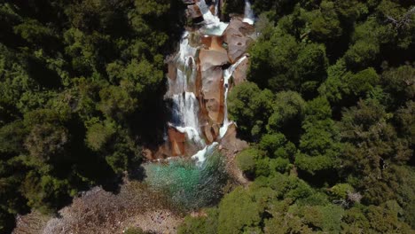 Cochamó,-Patagonia-Chile,-adventure-tourism-in-the-middle-of-nature,-green-forests,-mountains-and-waterfalls-with-crystal-clear-waters