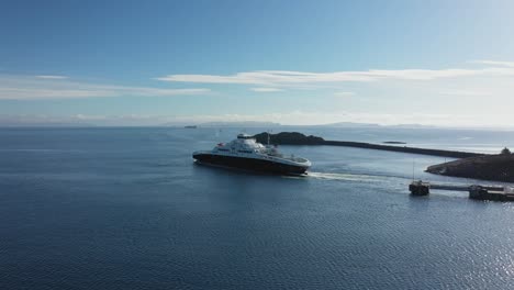 Ferry-Mastrafjord-departing-Arsvagen-ferry-pier-in-Rogaland-Norway---Beautiful-aerial-in-sunny-weather