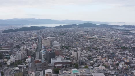 Wakayama-City,-High-Angle-Aerial-Pan-Establishing-Shot,-Japan