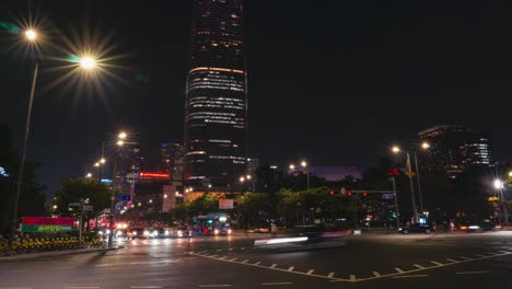 Busy-Night-streets-with-cars-traffic-near-Lotte-World-Tower-Mall-in-Seoul-zoom-out-timelapse
