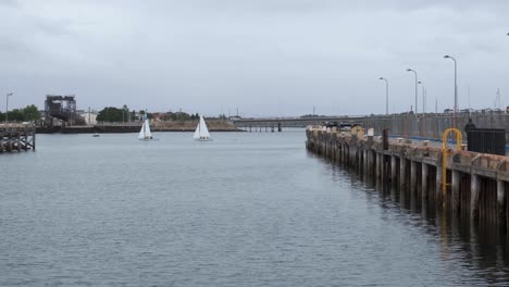 Small-sailboats-sailing-in-port,-Adelaide
