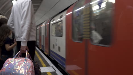 Underground-Train-Arriving-On-Platform-At-Victoria-Station-In-London