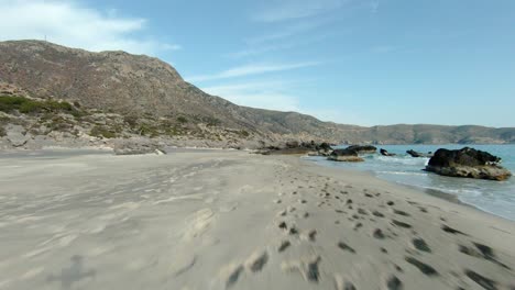 AERIAL:-Kedrodasos-beach-near-Elafonissi-beach-on-Crete-island-with-azure-clear-water,-Greece,-Europe