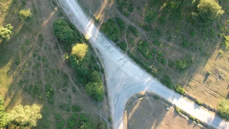 forest-road-junction-drone-rotating
