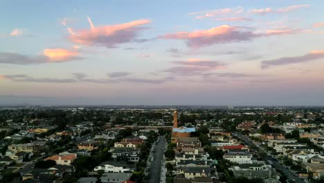 Distant-View-Of-Church-Tower-In-Manhattan-Beach,-California-At-Sunset