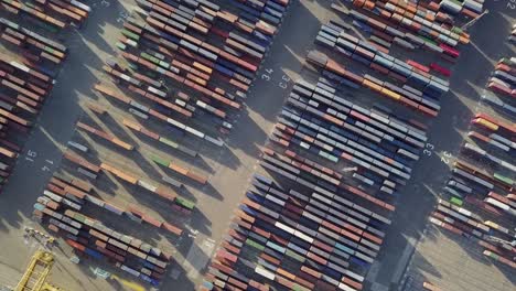 Aerial-Freight-Harbor-Containers-At-Cargo-Port-In-Barcelona-Top-Down-Shot