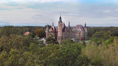 Aerial-view-historic-castle-in-Moszna-near-Opole,-Silesia,-Poland