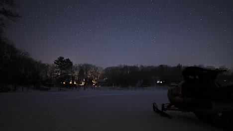 Night-sky-stars-timelapse-in-winter-snow-cabin-scene