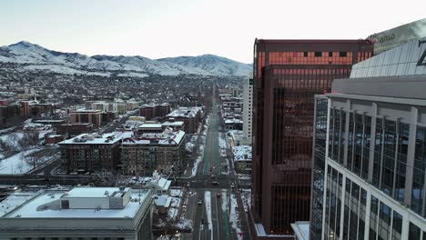Aerial-View-Close-to-Buildings-over-North-Temple-Street-in-Downtown-Salt-Lake-City-Utah---Forward-Movement