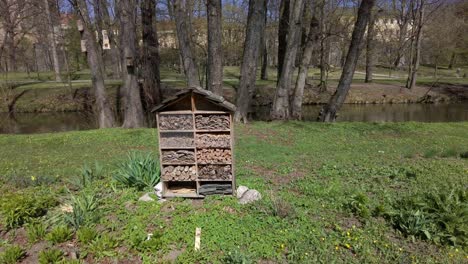 Insect-house-serving-as-an-ecological-refuge-for-insects-built-near-the-river-in-sunny-weather