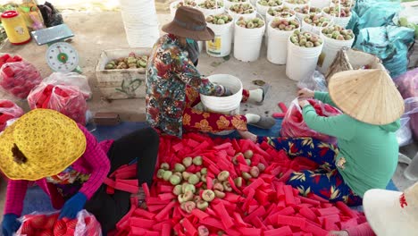 Top-view-of-woman-worker-packing-rose-apple-at-Can-Tho-city