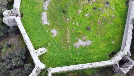 Marvelous-aerial-view-flight-Overfly-drone-footage-of-a-castle-ruins-of-a-byzantine-fortress-of-13th-century-wild-nature-Corfu-Greece