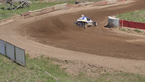 Car-buggy-competition-on-a-gravel-track,-fighting-for-the-first-place-by-participating-in-the-competition