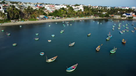 Scenic-aerial-panorama-of-tropical-coast,-fishing-village