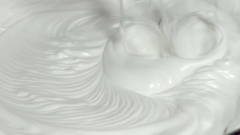Whipping-Cream-With-Handheld-Mixer.---close-up