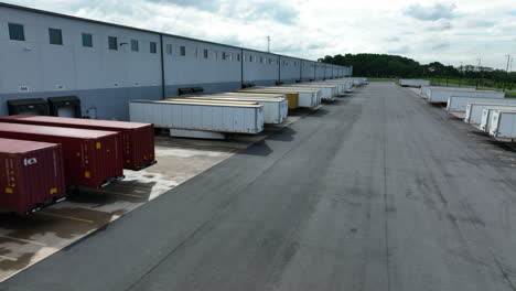 Truck-trailers-load-at-warehouse-distribution-center-dock
