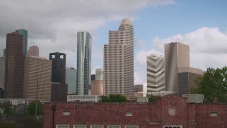Crane-shot-revealing-downtown-Houston,-Texas