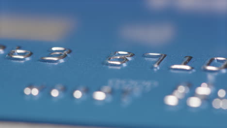 MACRO-SLIDER-shot-of-a-credit-cards-numbers