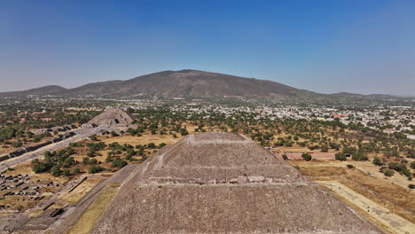 Teotihuacan-Mexico-Aerial-v1-establishing-shot-fly-around-spectacular-pyramid-of-the-sun-capturing-details-of-the-stone-structure-in-ancient-mesoamerican-city---Shot-with-Mavic-3-Cine---December-2021