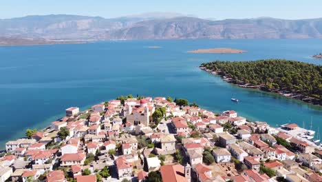 Picturesque-Marine-Village-Galaxidi-at-Fokida,-Greece-Mainland---Reversing-Aerial