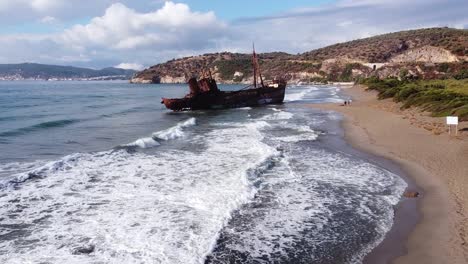 Shipwreck-Dimitrios-at-Valtaki-Beach,-Peloponnese,-Greece---Aerial-Forward