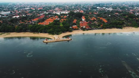 Beautiful-cinematic-Sanur-beach,-Bali-drone-footage-with-interesting-landscape,-fishing-boats-and-calm-weather