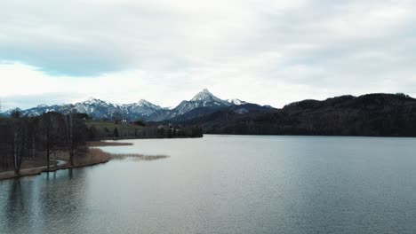 Drone-shot-of-an-Alpine-lake-of-Bavaria,-Germany