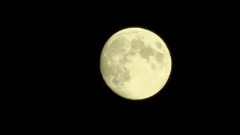 A-moving-full-moon-in-the-sky-with-details-on-the-surface