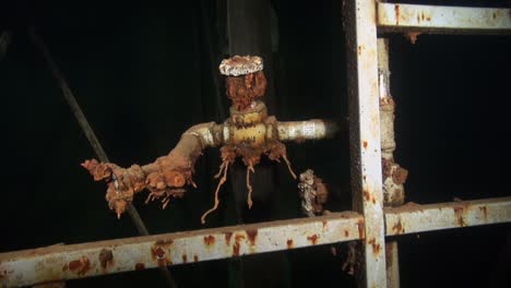 Rusty-water-tap-in-flooded-nuclear-silo