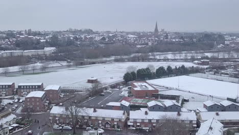 Ascending-drone-shot-of-a-snowy-Exeter-looking-towards-the-town-centre-CROP