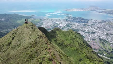 Drone-4000ft-up-in-the-air-in-Oahu-getting-a-shot-of-the-mountain-top-trail-of-the-Stairway-to-Heaven,-revealing-a-new-perspective-of-the-mountains