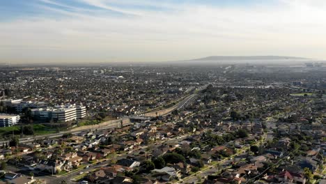 Moving-aerial-timelapse-approaching-a-highway-in-Los-Angeles