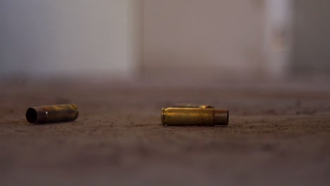 Bullet-Casing-hitting-the-floor,-Rifle-Cartridge