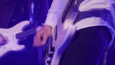 Man-playing-guitar-close-up