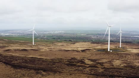 Aerial-footage-of-wind-turbines-in-a-field