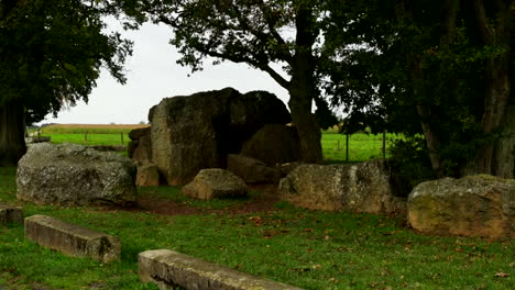 A-Dolmen-is-a-megalithic-burial-chamber-from-the-Neolithic-that-consists-of-three-standing-stones,-covered-by-a-capstone