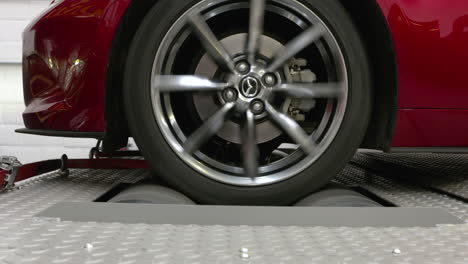 Close-ups-from-a-car-on-a-rolling-road-or-dynamometer