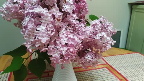 Lilacs-on-a-kitchen-table-on-a-sunny-day