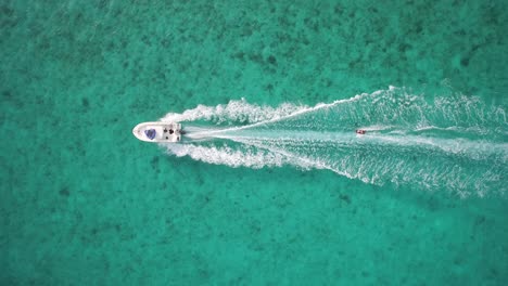 Aerial-Cenital-Plane-shot-of-a-person-skiing-in-the-San-Jose-Island