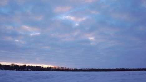 Evening-timelapse-on-the-frozen-water-of-Silver-Beach-Lake