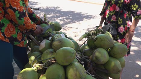 Medium-Shot-of-Chopping-Coconuts-Ready-to-Sell