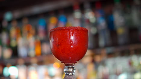 Strawberry-margarita-rotating-at-mexican-bar