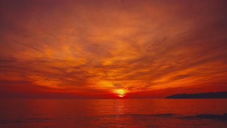 A-beautiful-and-romantic-sunset-at-a-beach-in-Croatia,-captured-as-a-Cinemagraph-time-lapse