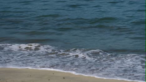 Calmed-ocean-waves-crashing-at-the-beach-in-Bucerias-Mexico