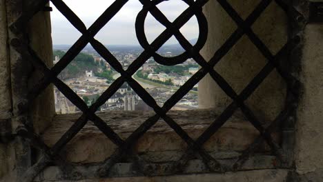 Salzburg-viewed-through-the-bars-of-fortress-Hohensalzburg