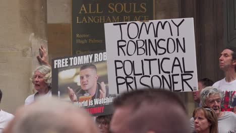 Tommy-Robinson-supporters-holds-signs-outside-the-BBC-studio-in-London