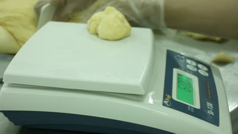 Slicing-And-Weighing-Bread-Dough